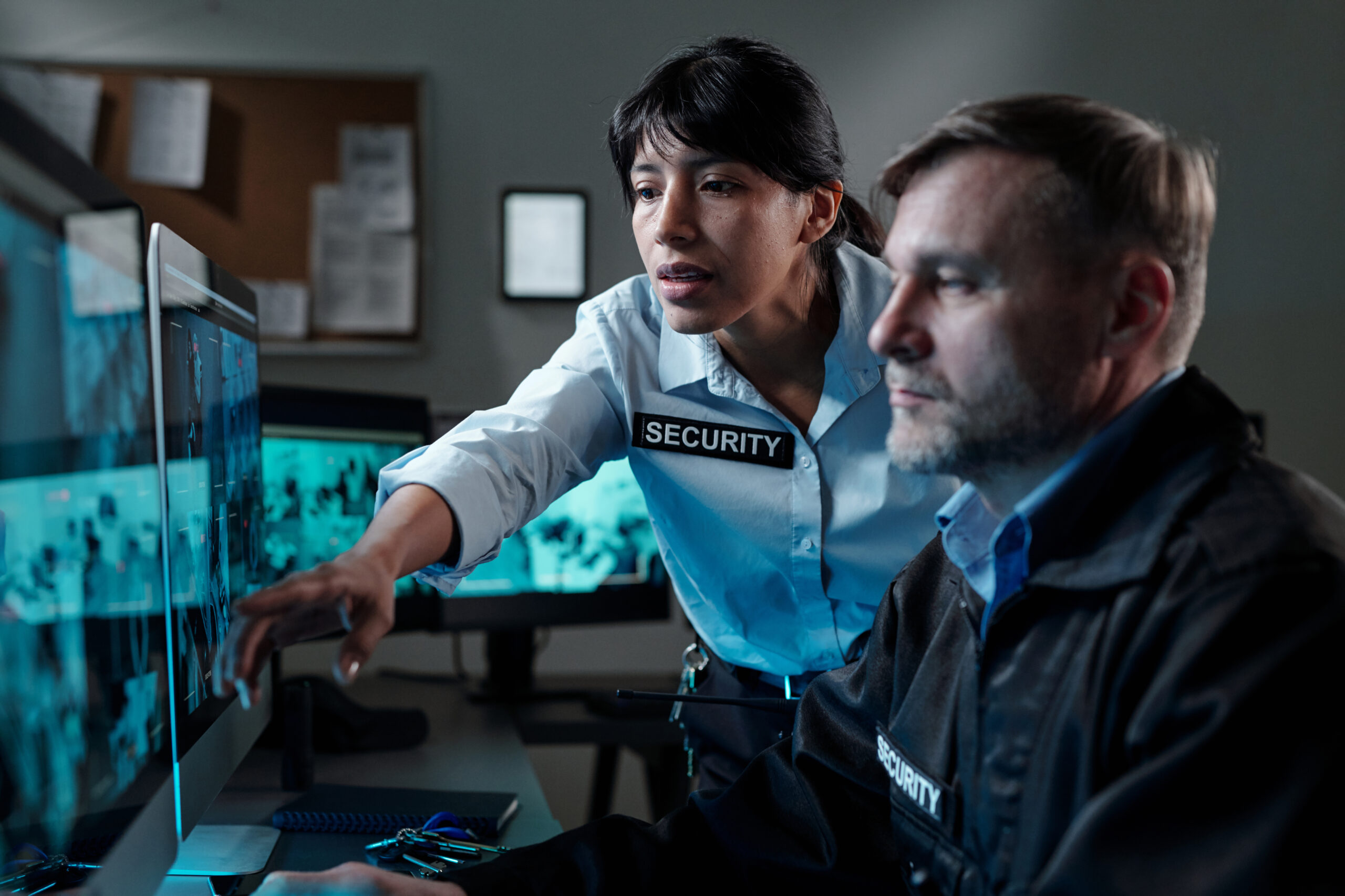 Airport security guards assessing an airport bomb threat