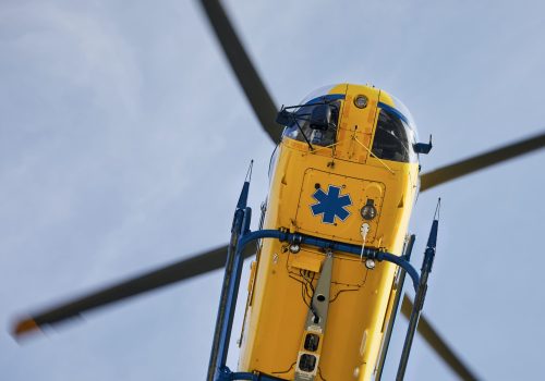 A flying air ambulance transporting a patient.