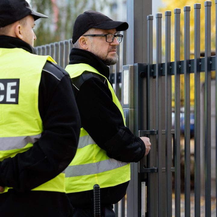 Police officers responding to a potential airport bomb at Heathrow airport